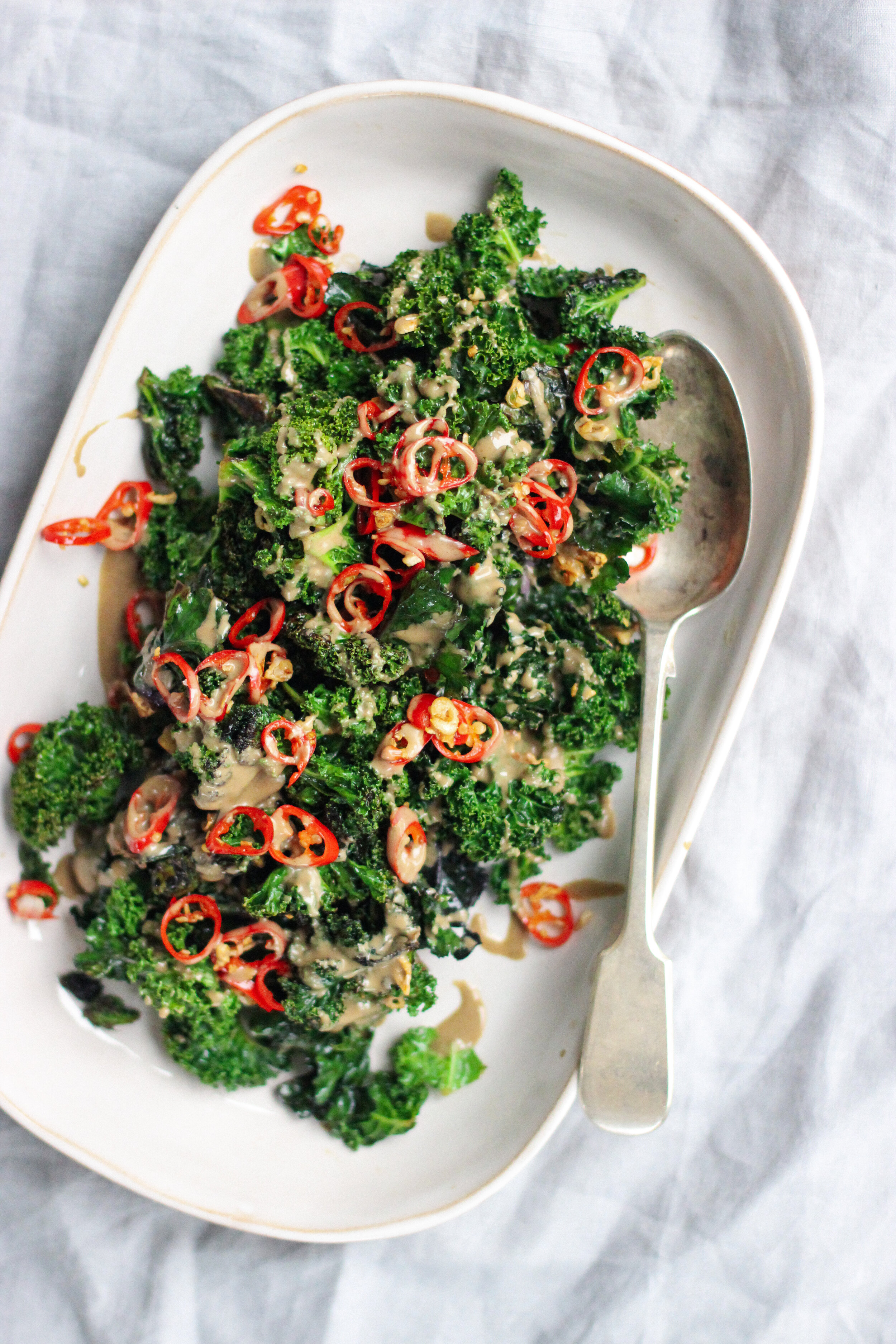 tahini greens, fried garlic + chilli.JPG
