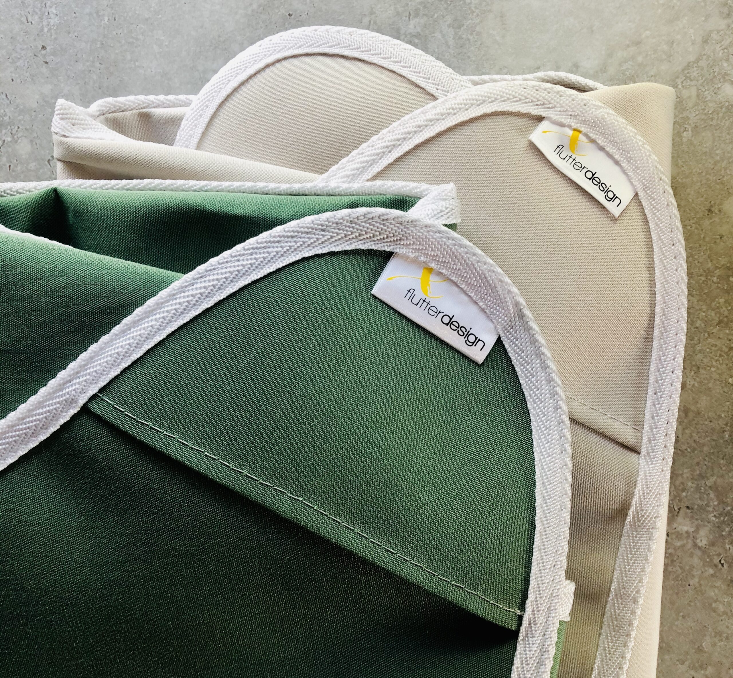 Flutter Design chair covers in basil and white oyste