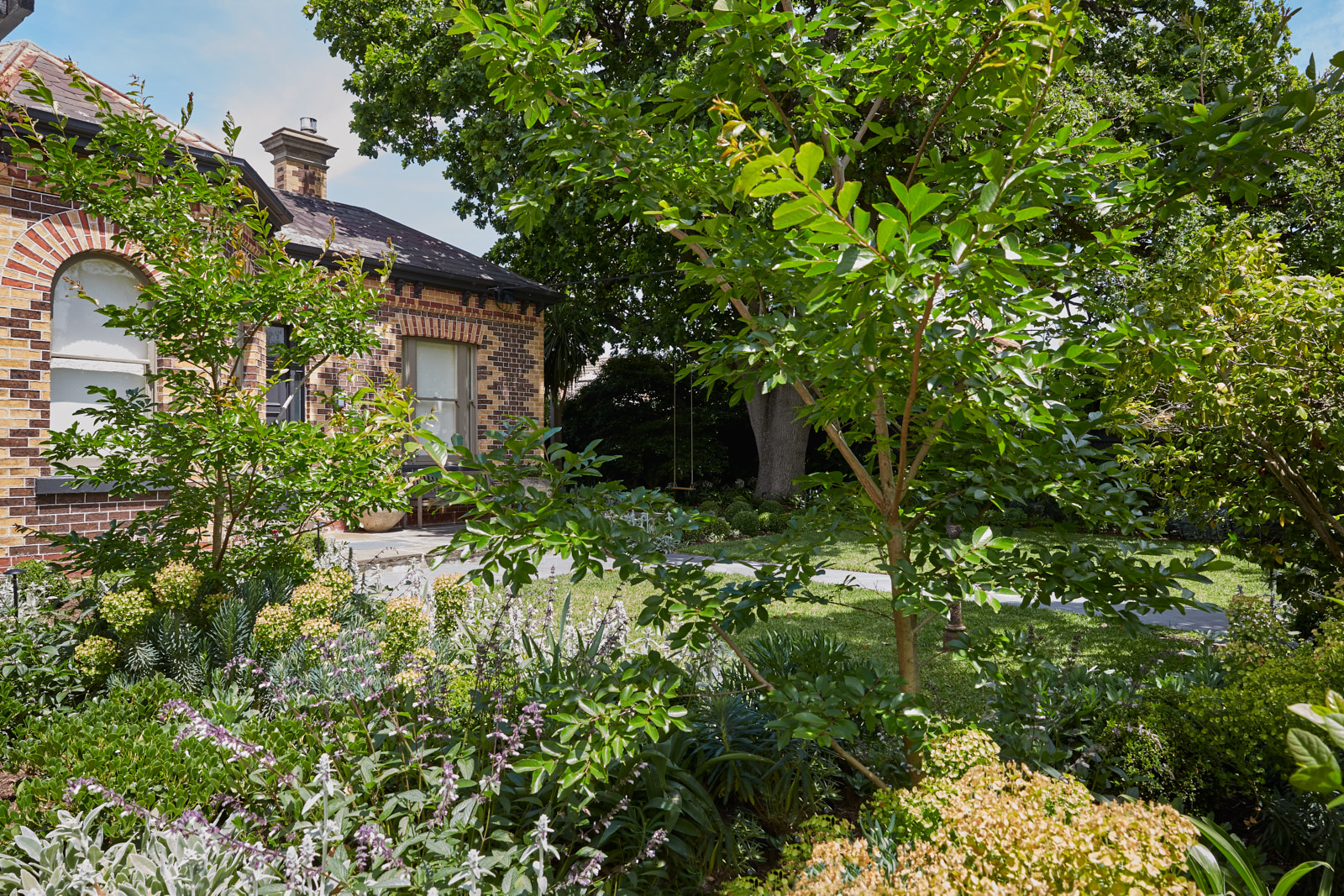 Cottage garden surrounding a period home