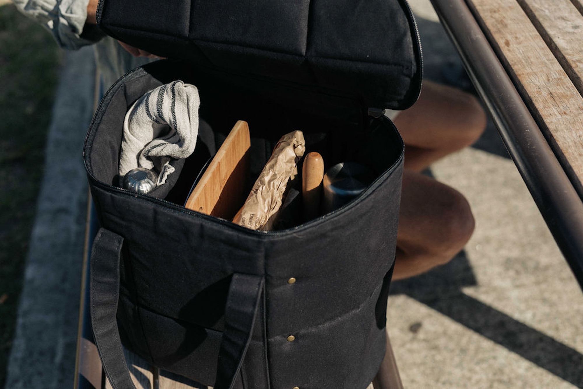 Susie’s Bags black picnic bag loaded with kindling and firewood