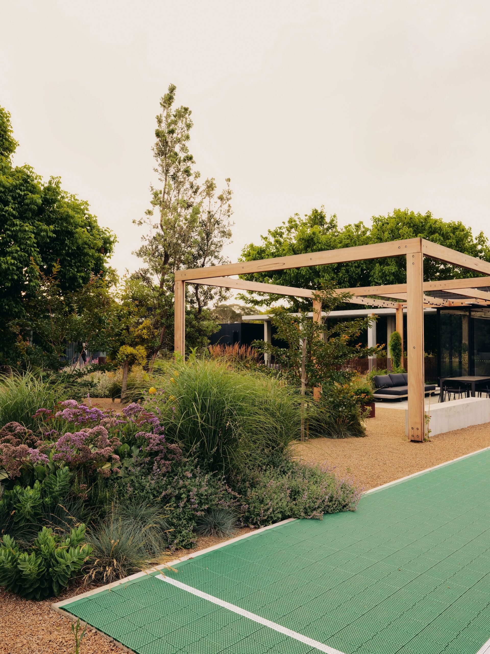 "Modern Pergola Garden Retreat Contemporary wooden pergola framed by drought-tolerant plants and gravel path – Phillip Withers