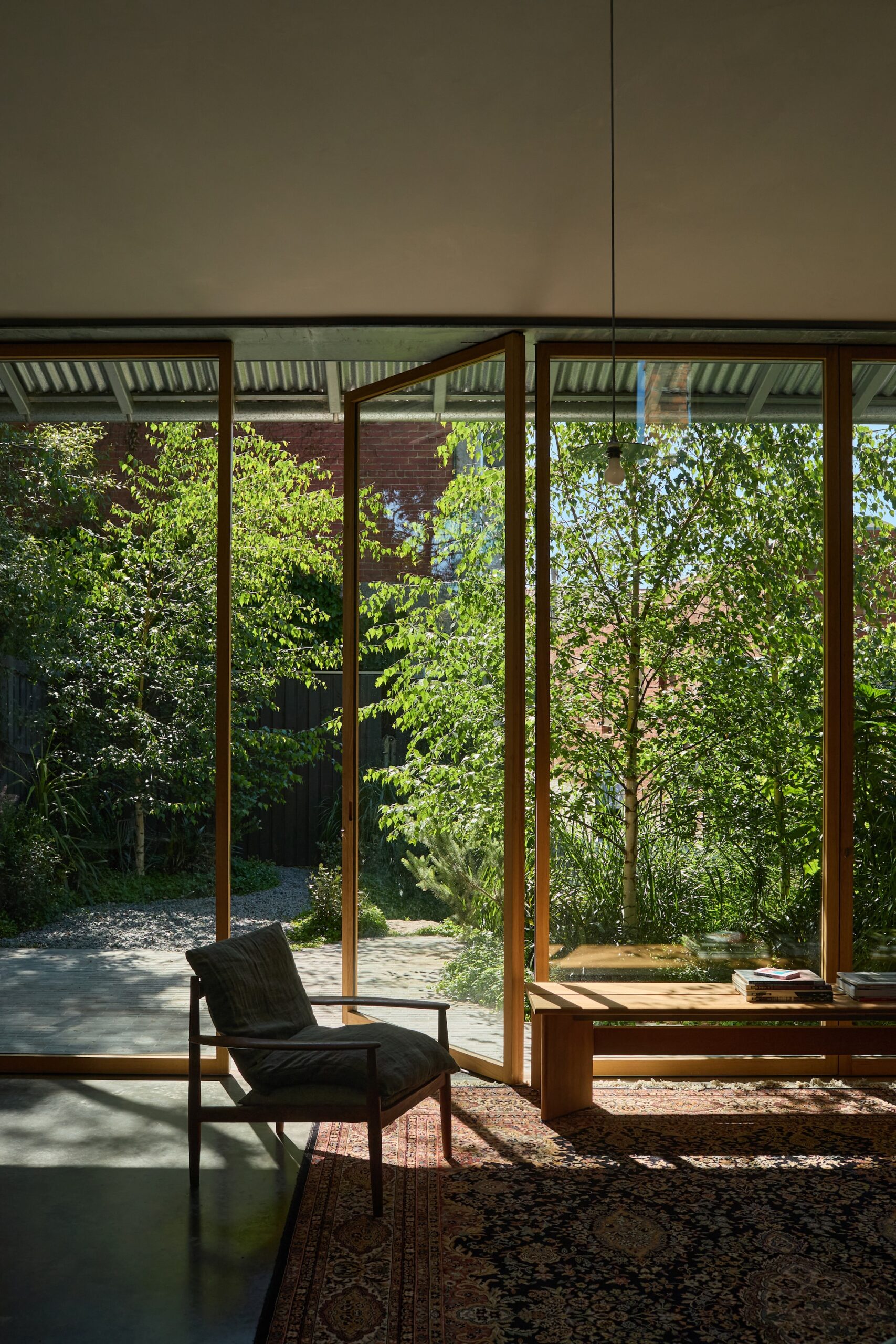 x Jala’s lush planting enhancing indoor-outdoor harmony.