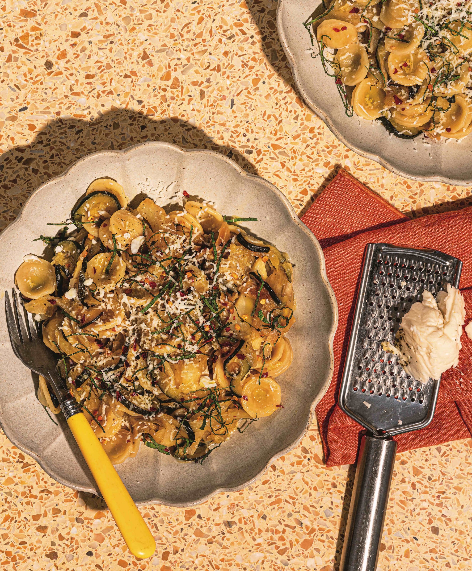 Orecchiette served on plate with grated cheese, for recipe book I’ll cook by Sophie Godwin