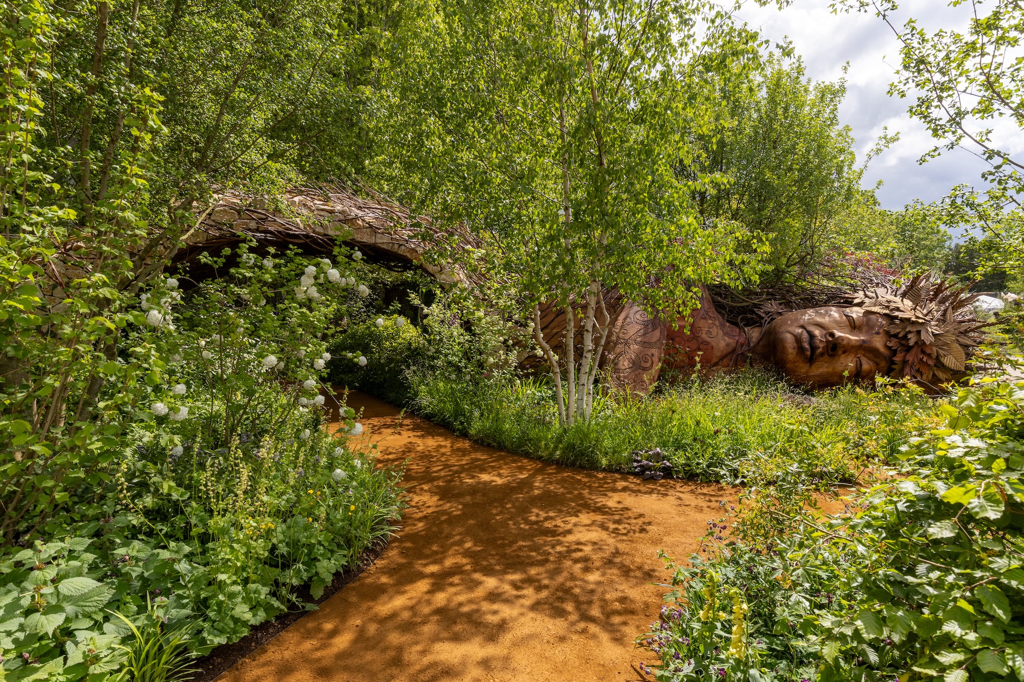 1 Flowing path framed by trees, shrubs and meadow planting in Sarah Eberle’s RHS CFS garden.